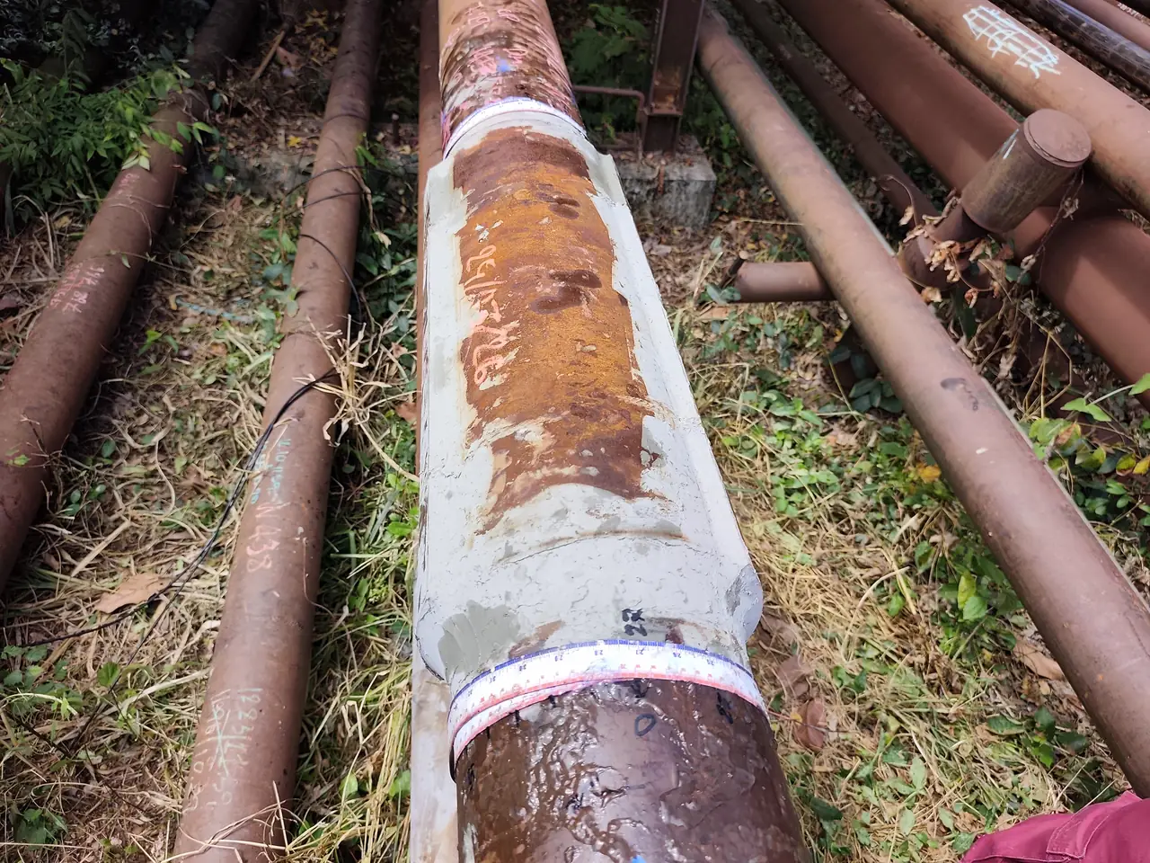 Corrosion sizing under a cold-bonding composite wrap repair using HOMC Guided-Wave without removing the wrap